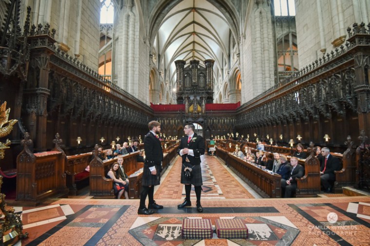 natural wedding photography Gloucester Cathedral groom
