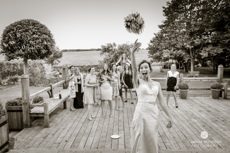 Cripps Barn wedding photography bouquet toss