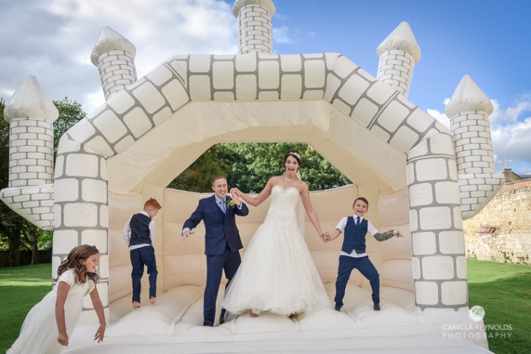 Cotswold wedding Eastington park bouncy castle