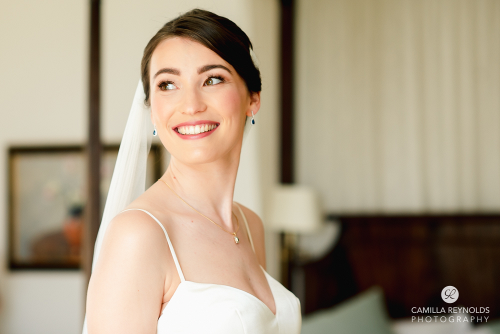 smiling bride Gloucestershire wedding photography great tythe barn tetbury