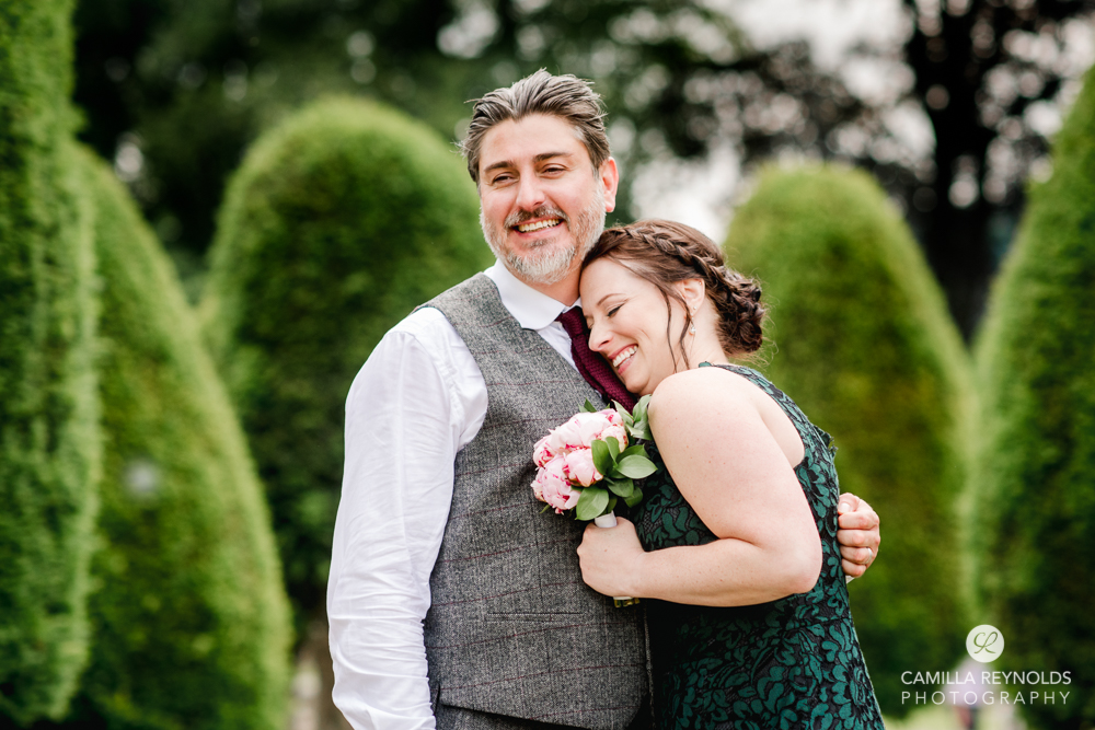 happy wedding couple church wedding painswick uk