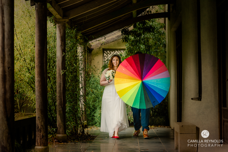 rainbow umbrella vibrant relaxed wedding photography cotswolds 