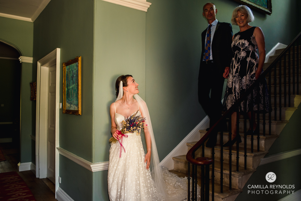 bride walking down matara wedding cotswolds