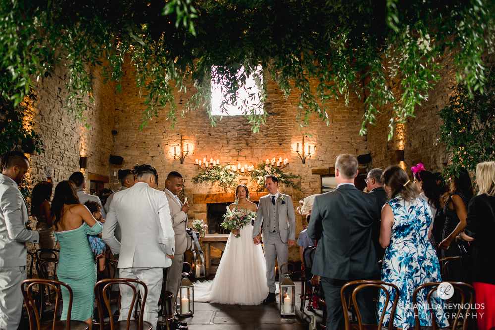 bride and groom at cripps barn wedding venue uk