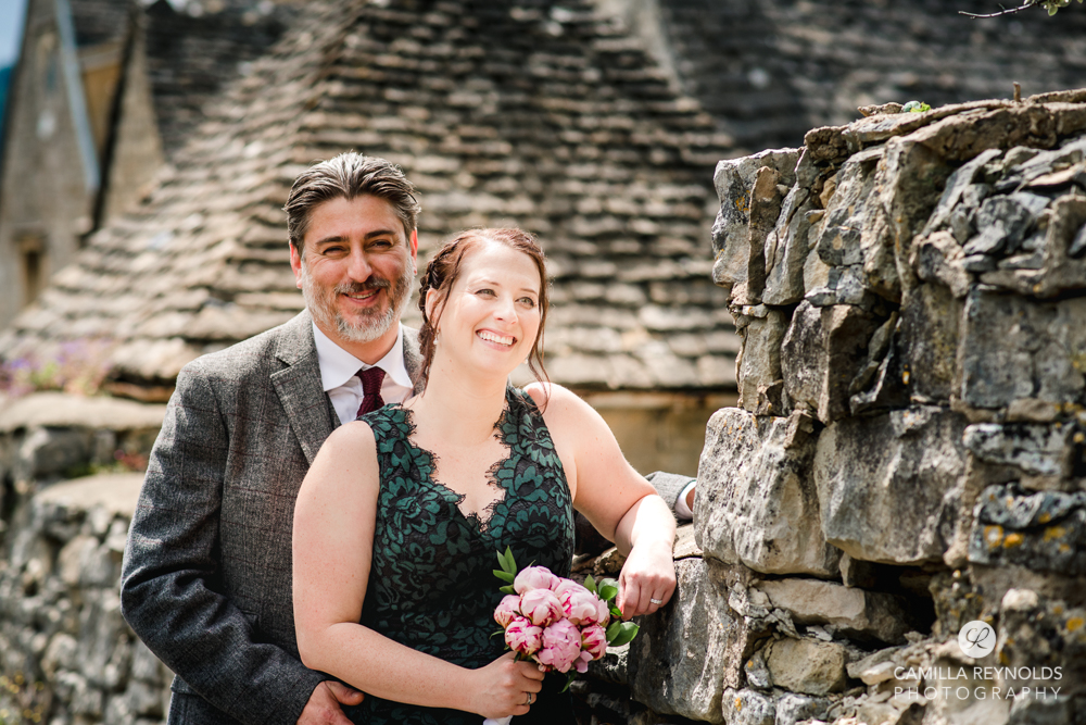 bride and groom cotswolds stone wall wedding photography