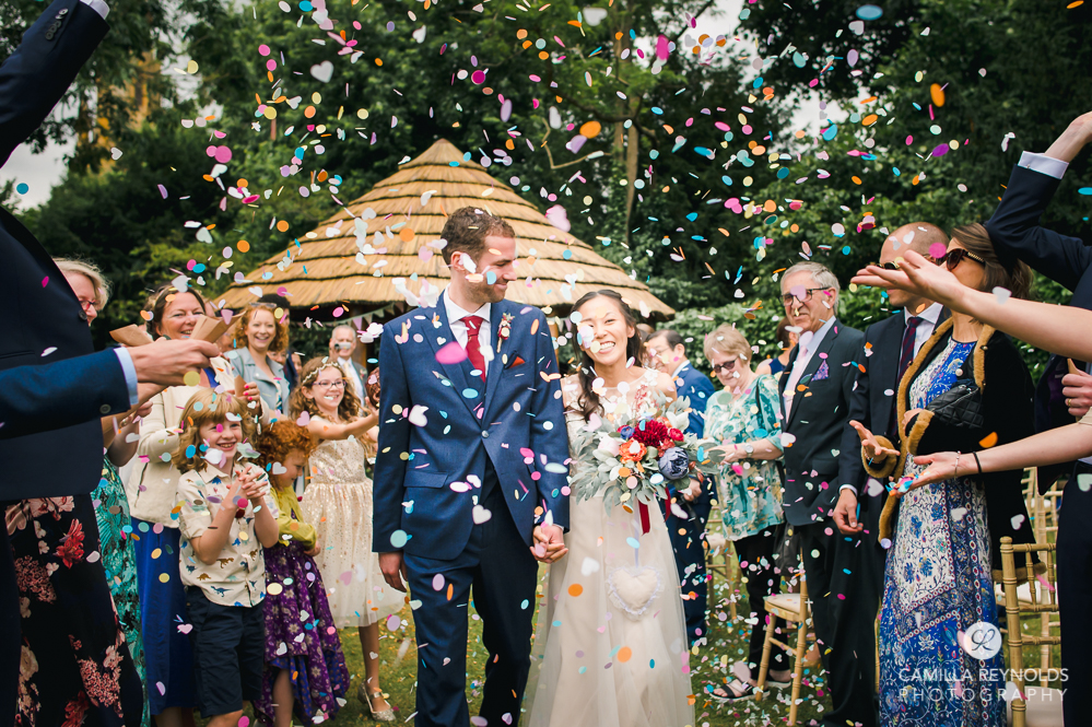 confetti bride and groom manor house hotel wedding in moreton in marsh uk