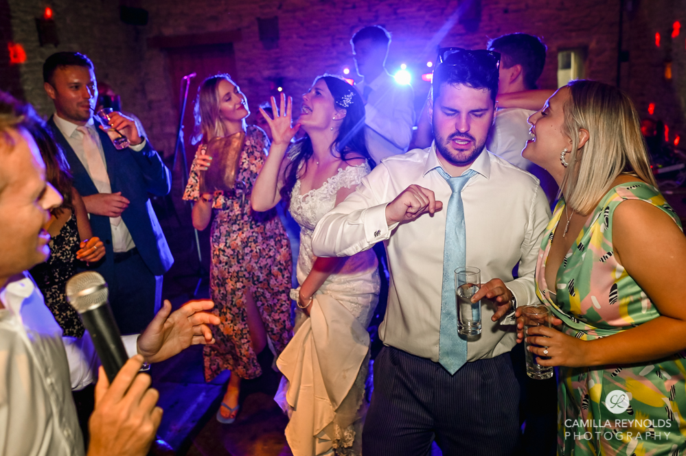 bride singing dancing fun natural wedding photography uk