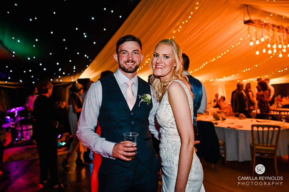 bride and groom dancing colourful wedding disco cotswolds uk