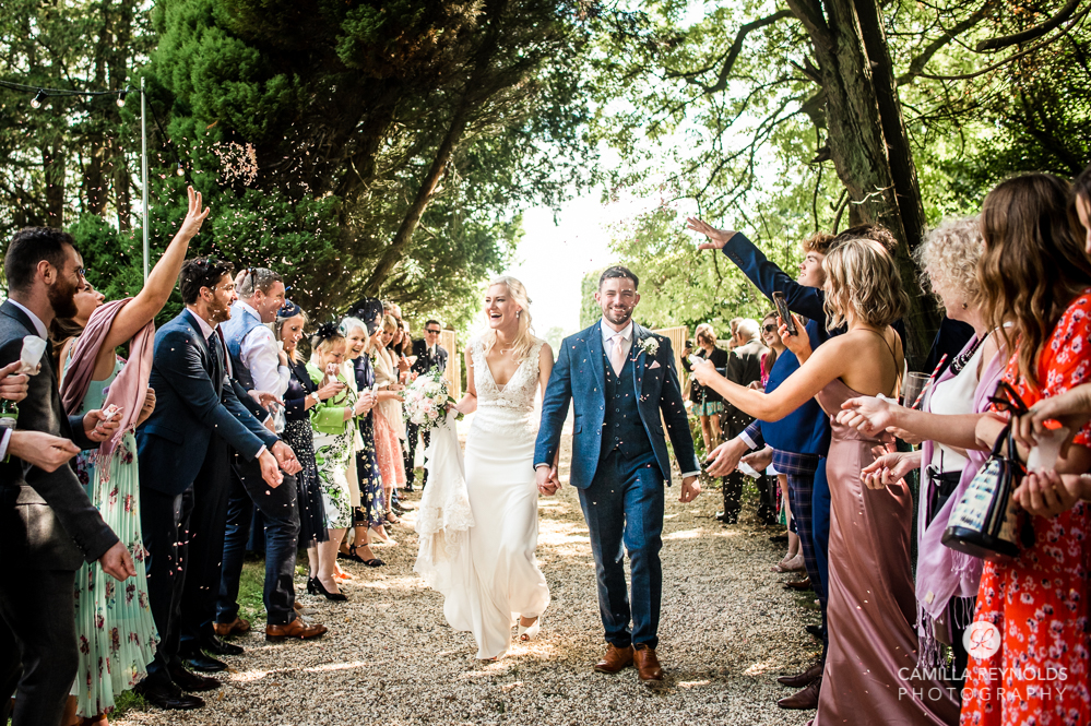 bride and groom confetti shot Painswick uk