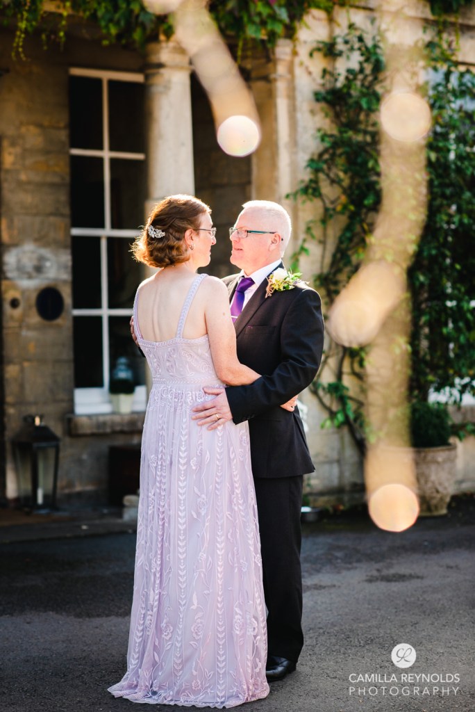bride and groom romantic photo burleigh court hotel cotswolds