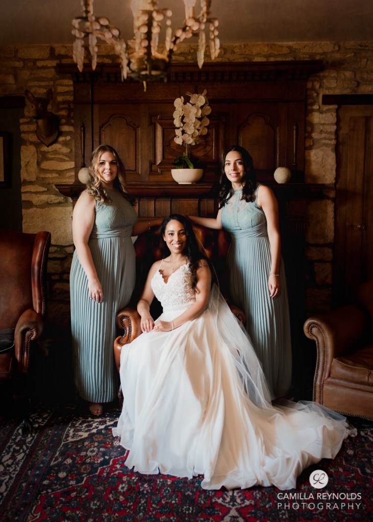 bride and bridesmaids traditional panel room old lodge wedding
