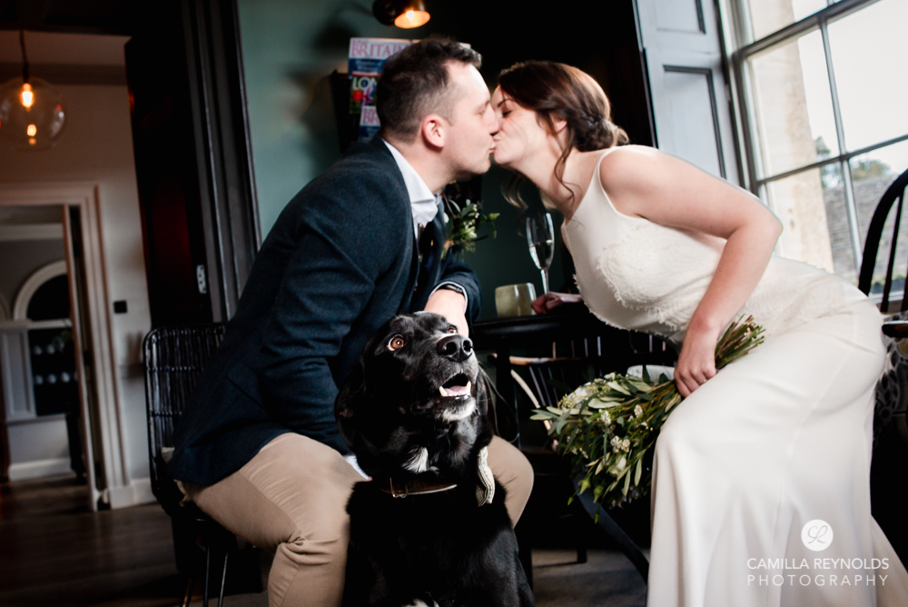 bride groom first kiss with dog painswick cotswolds