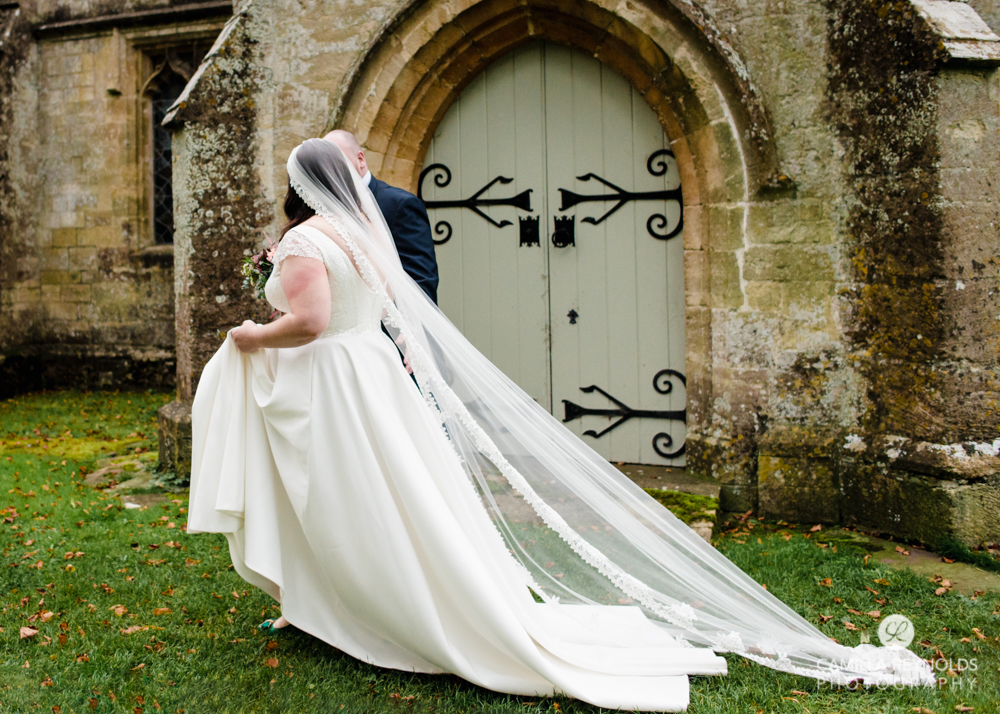 bride wedding dress and veil church gloucestershire