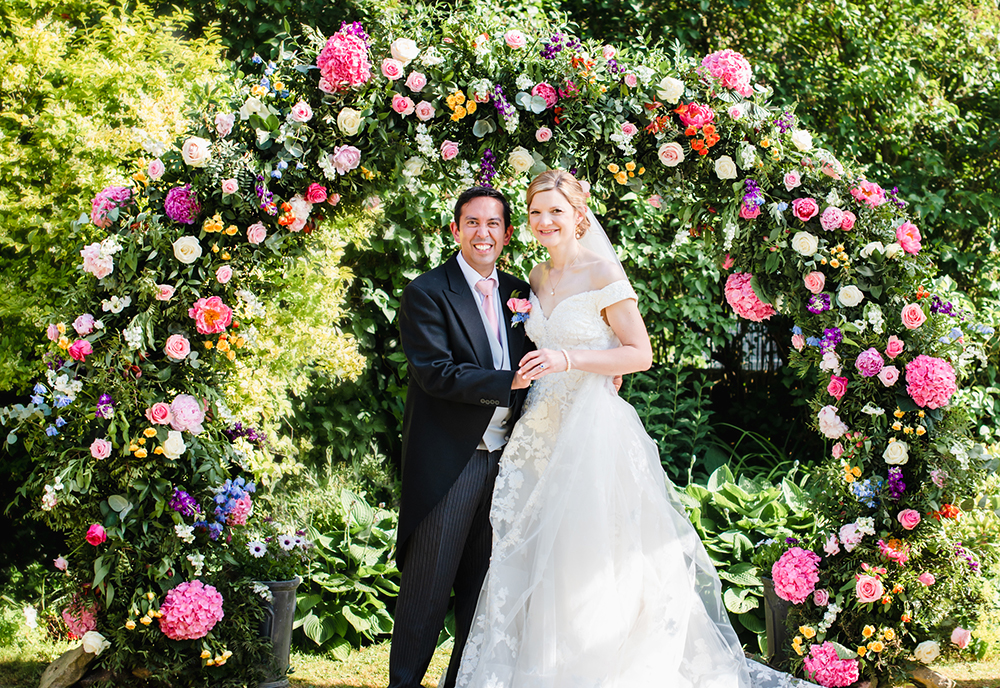 bride and groom flower arch wedding 