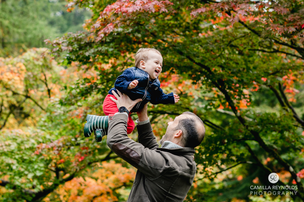 fun family photo shoot boy laughing cotswolds