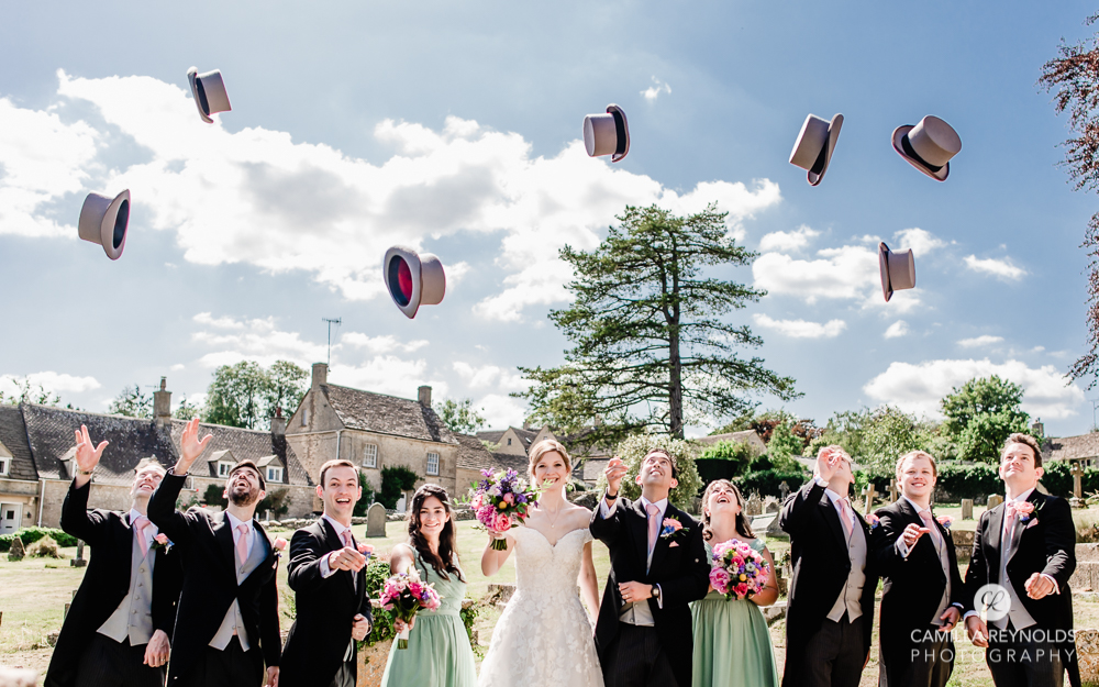 groomsmen throwing hats fun wedding photography 