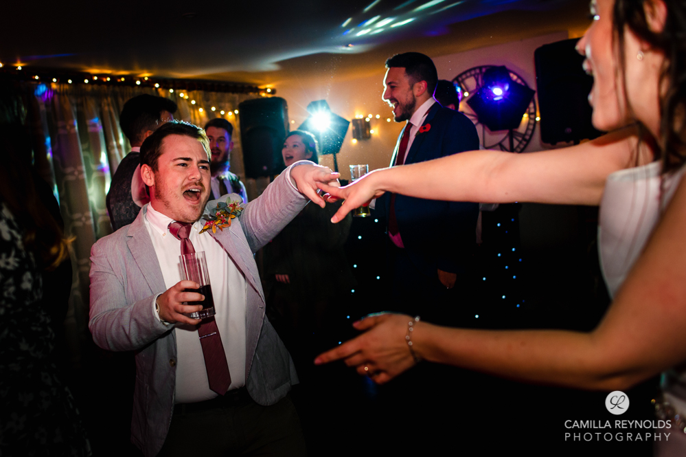 silly dancing natural wedding photography bear of rodborough hotel
