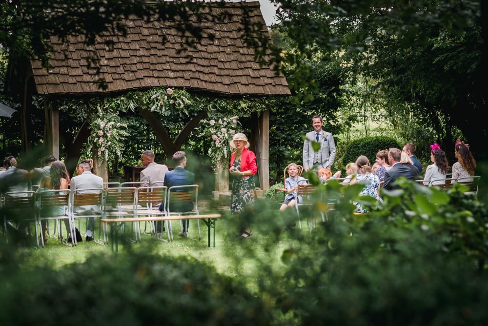 outdoor wedding ceremony  cripps barn gloucestershire