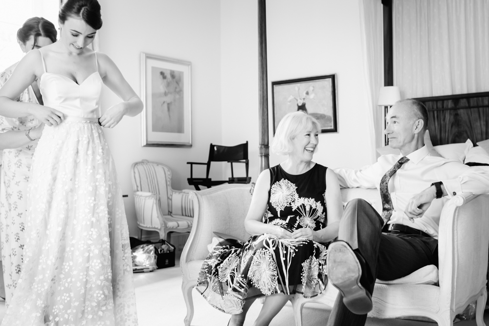 parents watching bride getting ready documentary photography