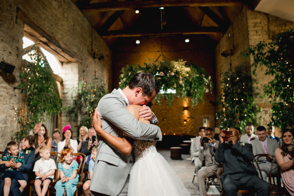 bride groom hugging gloucestershire wedding photography