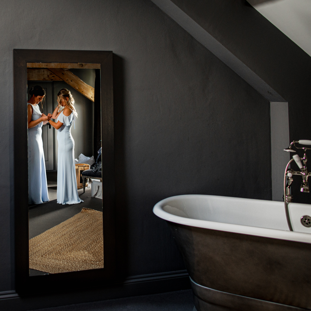 bridesmaids blue dresses reflection cotswolds wedding