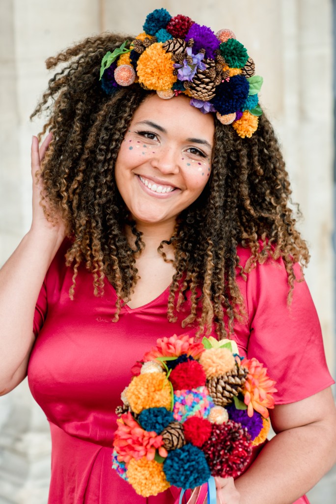 bride with pom pom bouquet and tiara