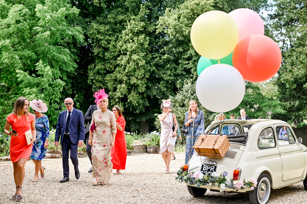 colourful wedding guest balloons