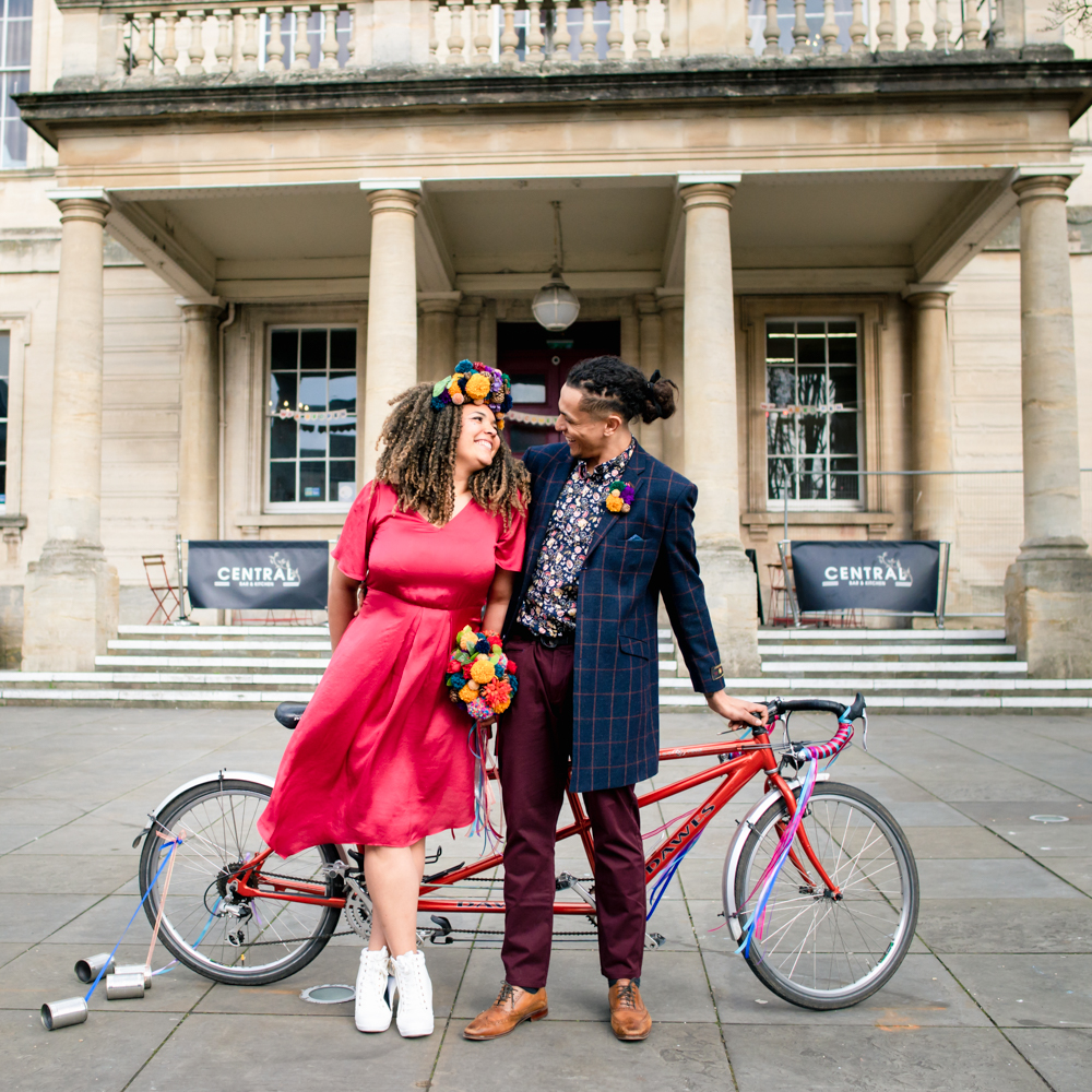 bride and groom with tandem bicycle stroud wedding