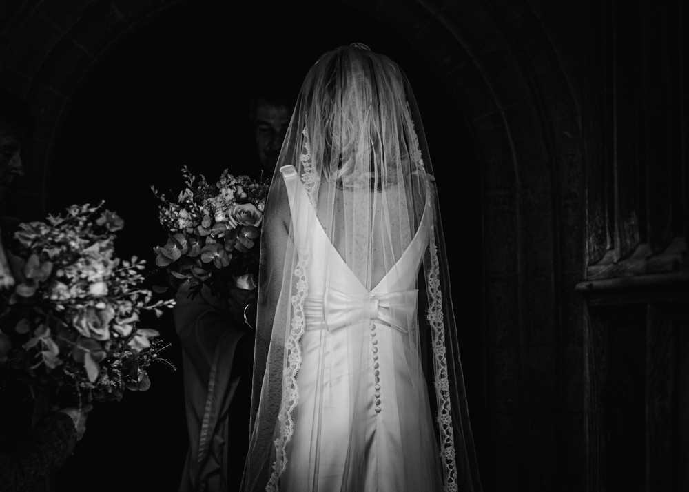 bride dress and veil black and white photo