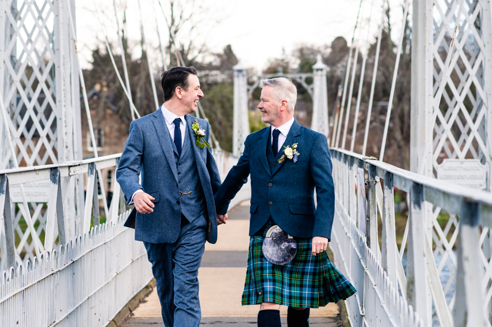 two grooms walking same sex wedding 