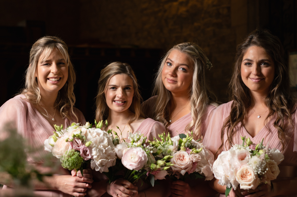 bridesmaids pink dresses church 