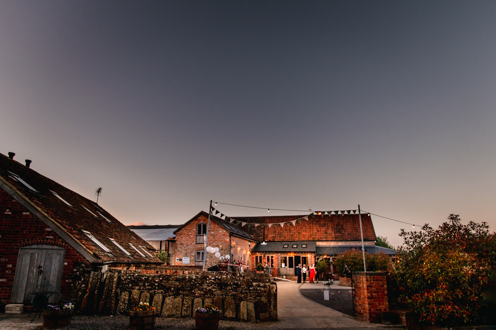 milton end farm wedding venue at night 