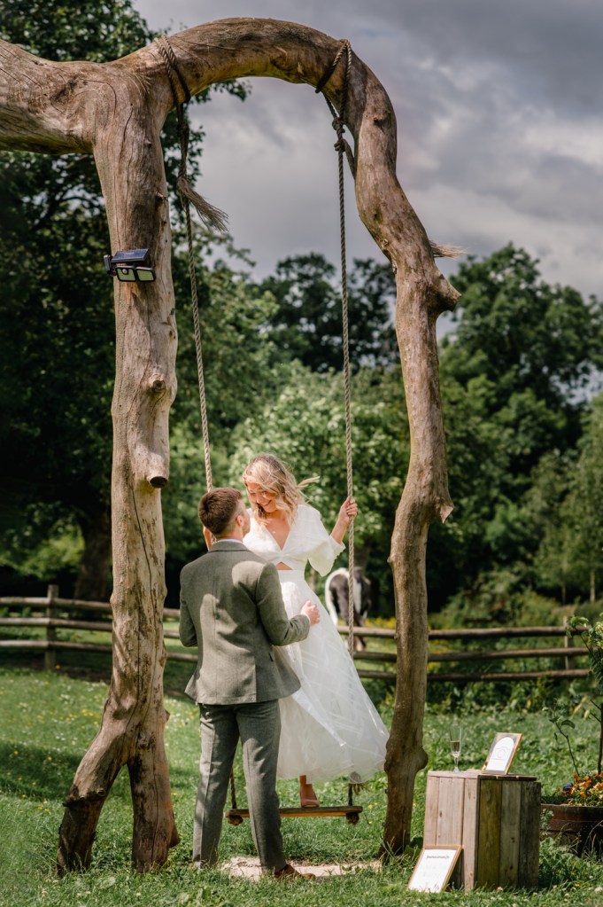 bride on swing wedding Cotswolds