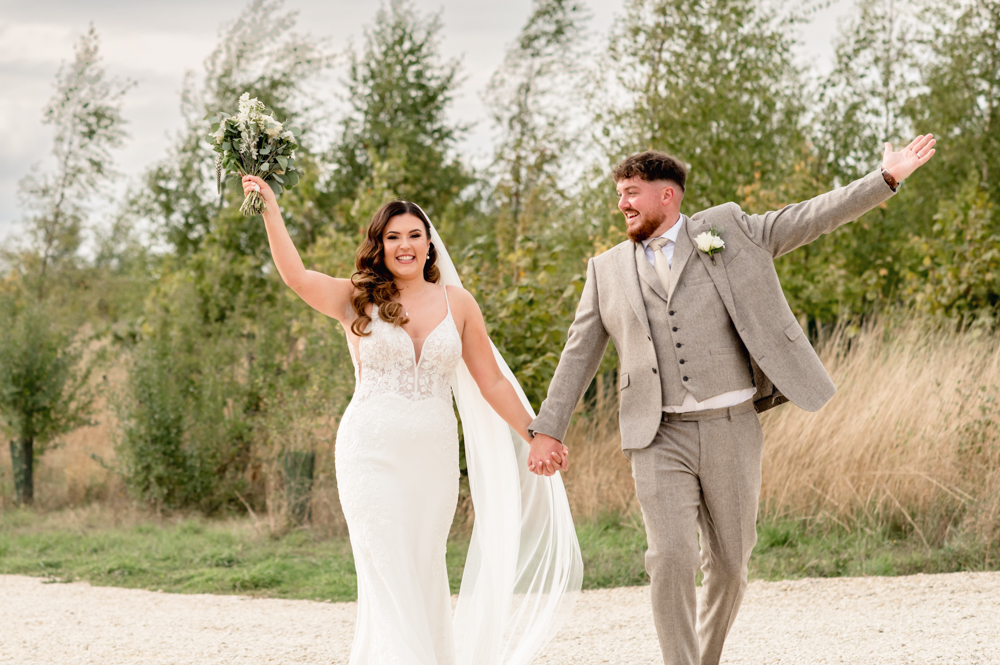 bride and groom happy wedding cotswolds