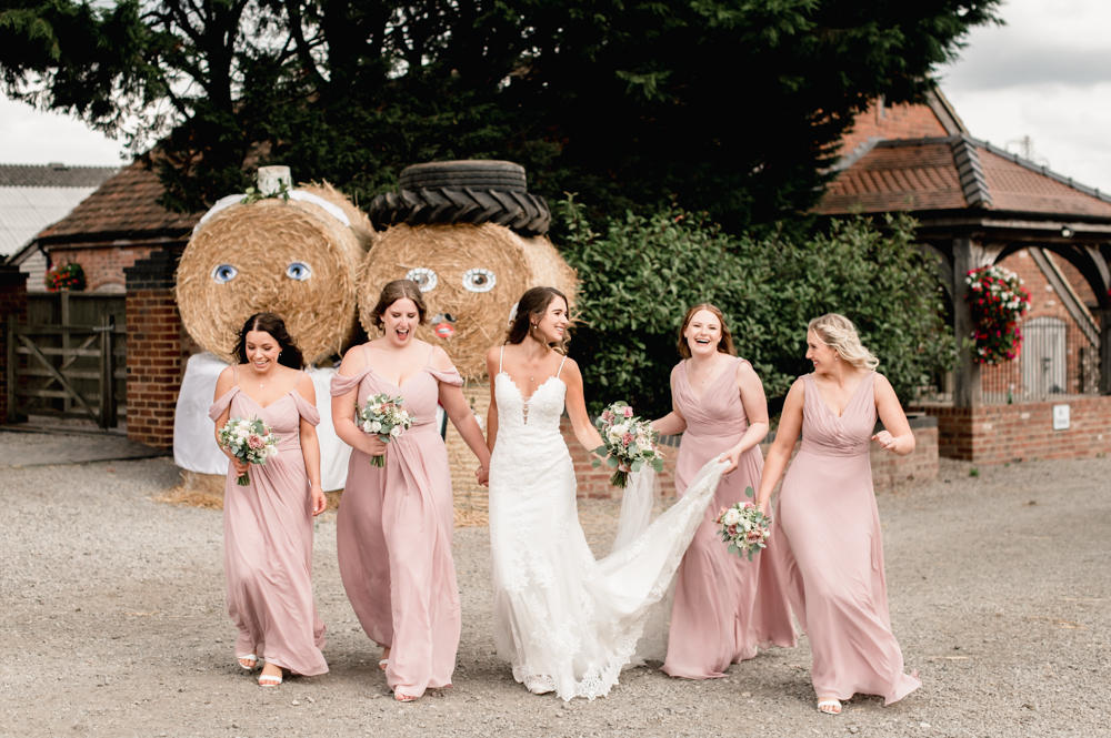 bride farm wedding hay bales