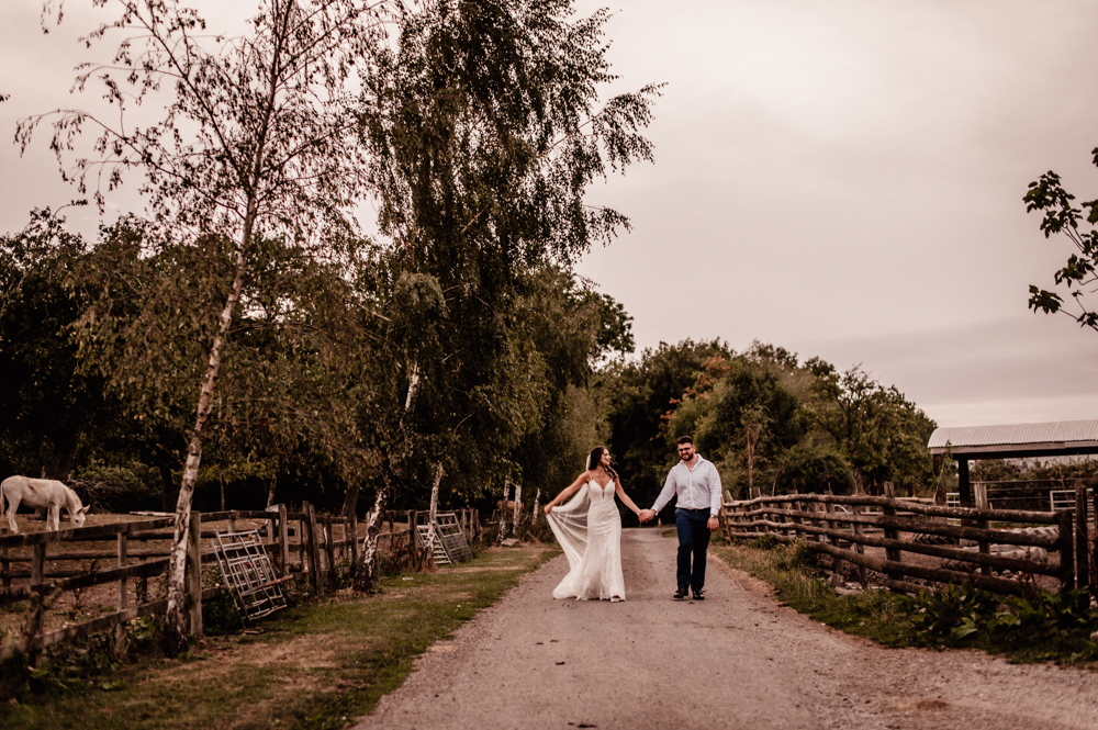 bride and groom country road