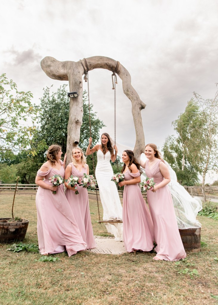 bride on swing cotswolds wedding miton end farm