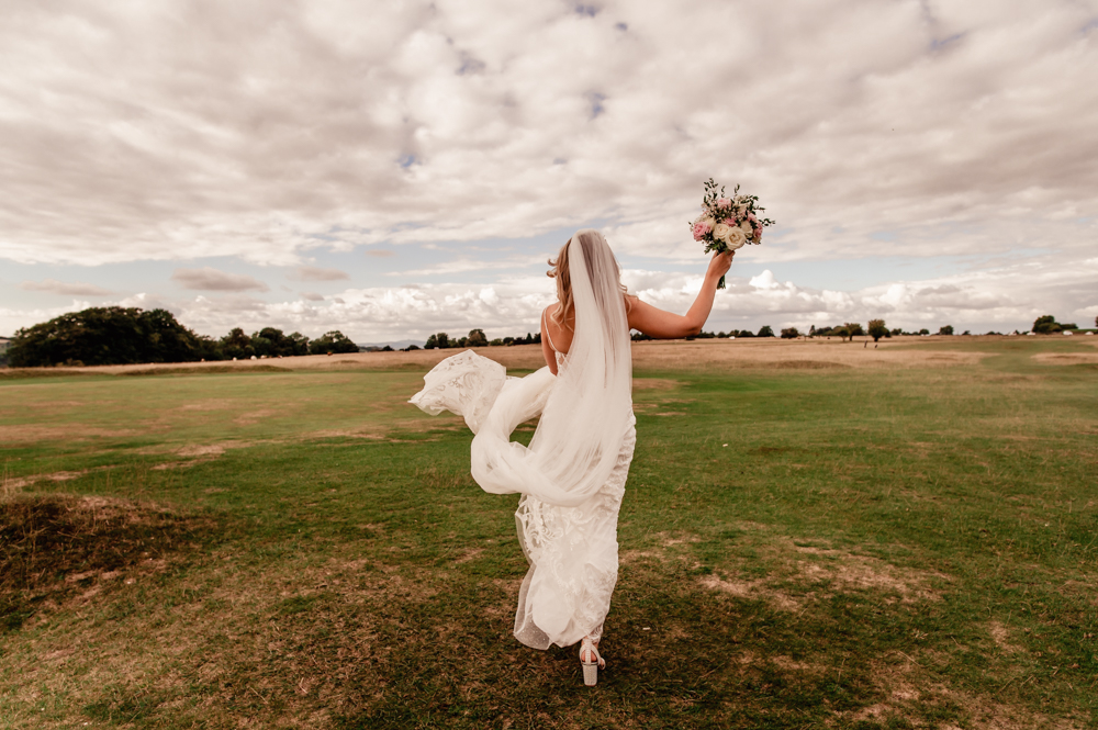 bride walking countryside
