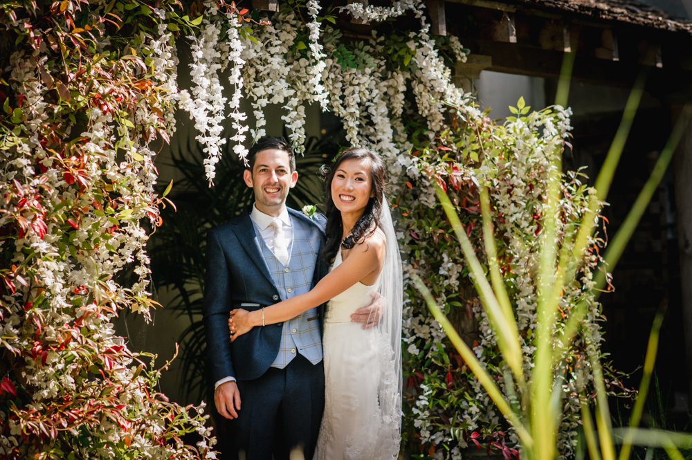 wisteria arch bride and groom at matara centre