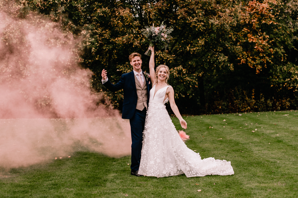 bride and groom stone barn wedding cotswolds