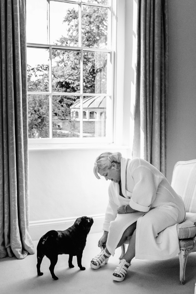 dog watching bride wedding documentary photography