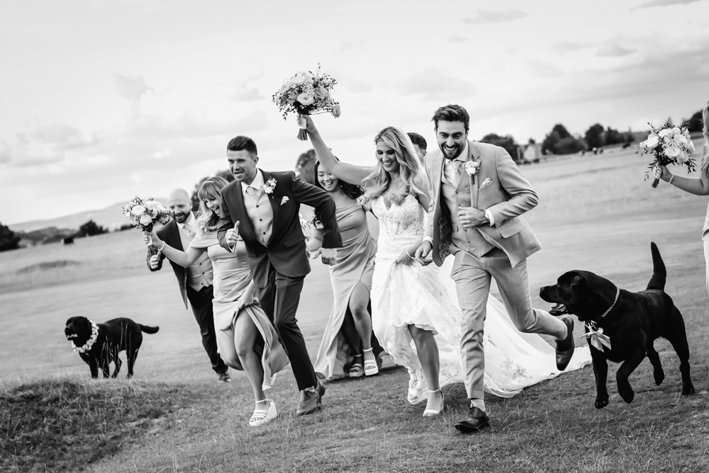 bride and groom running 