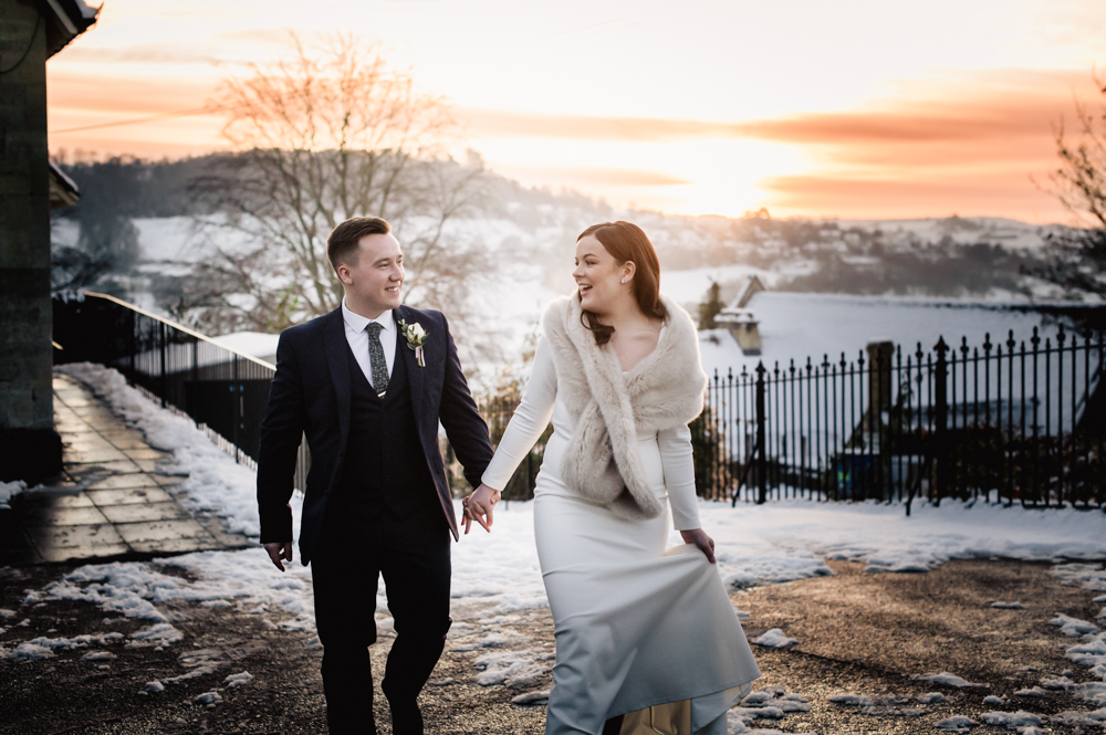 bride and groom walking  stroud registry office wedding