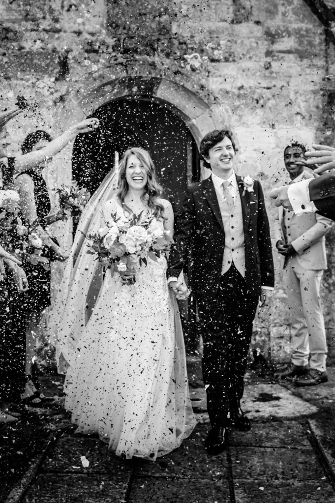 bride and groom confetti eastington park wedding gloucsetershire