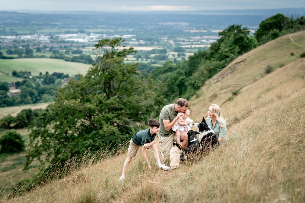 family with dogs beautiful views in the hills Stroud
