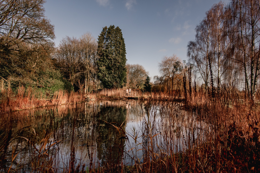 couple on bridge stunning lake
