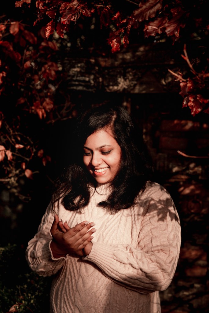 woman admiring engagement ring