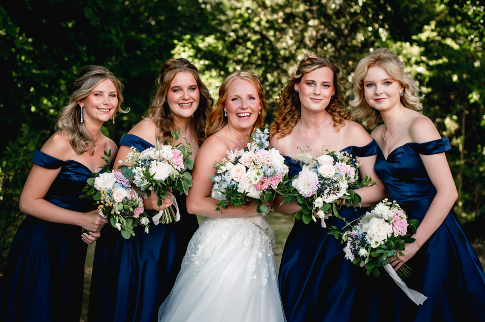 bride and bridesmaids cripps barn