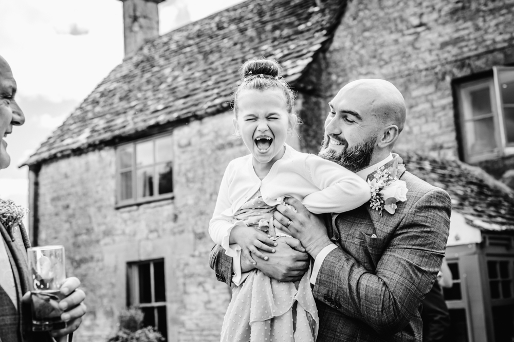 groom and flower girl