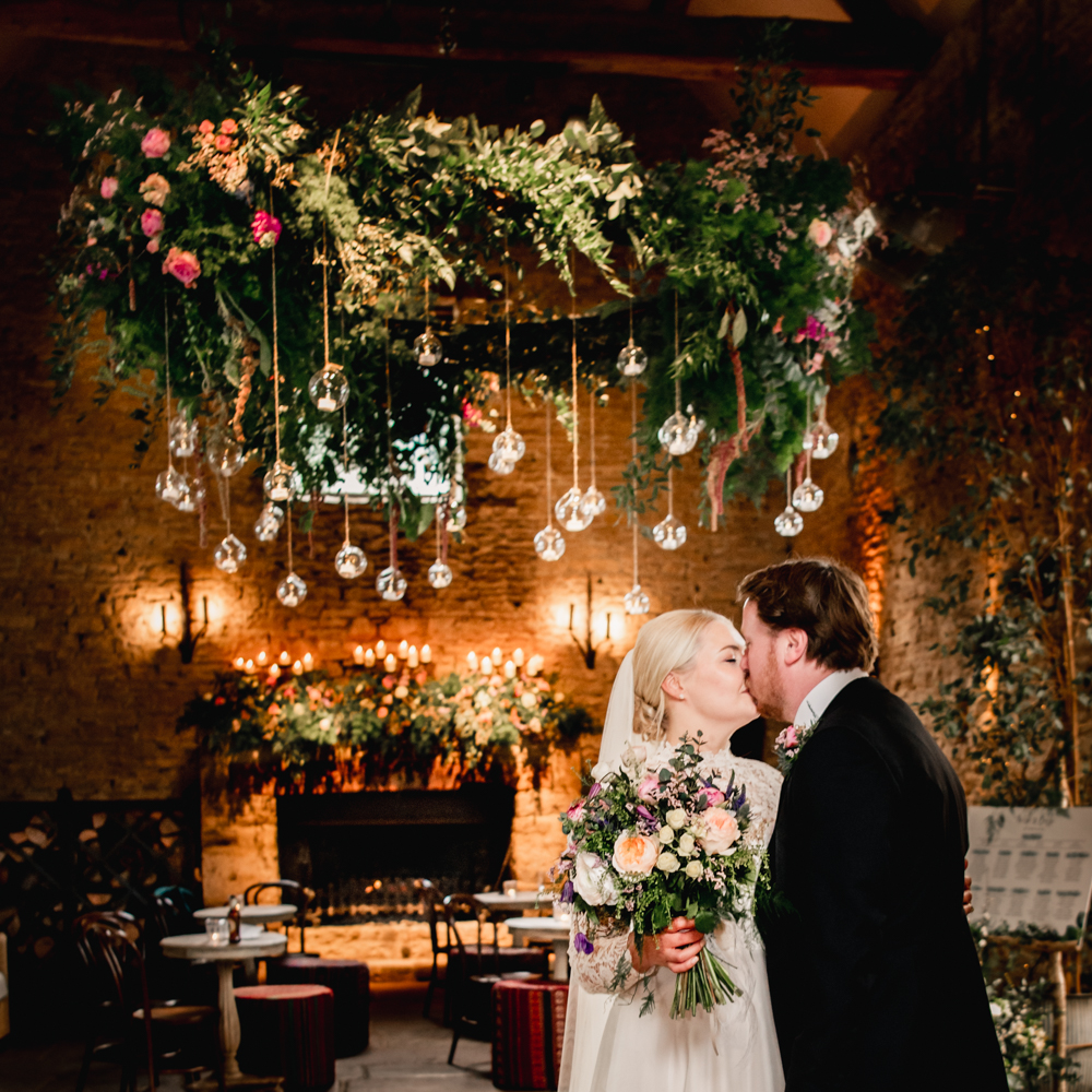 bride and groom wedding flowers cripps barn cotswolds